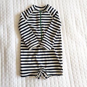 Primary Baby one-piece rash guard in navy stripe, 18-24 mo